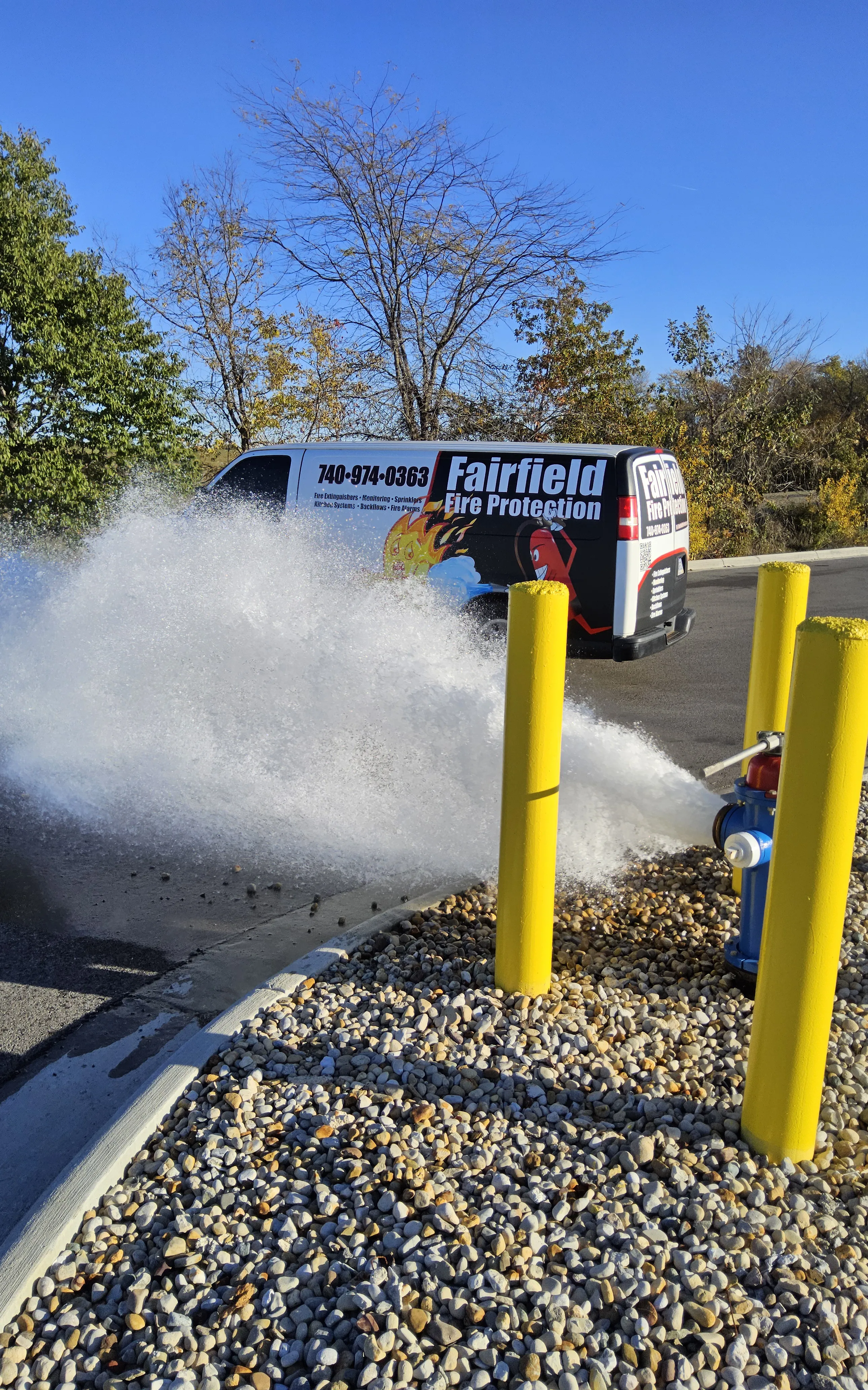 Fairfield Fire Protection technician inspecting a commercial fire sprinkler system in Ohio
